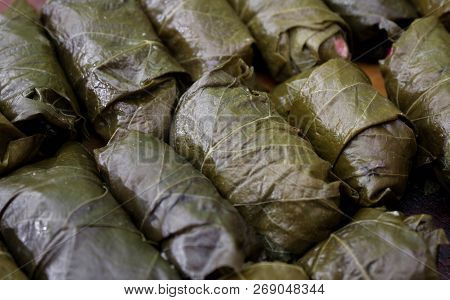Dolma, Stuffed Grape Leaves With Rice And Meat. Top View. Delicious And Healthy Food.