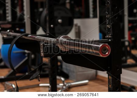 A Gym With A Lifting Dumbbell Bar And A Lifting Belt. Sports, Lifting Equipment;