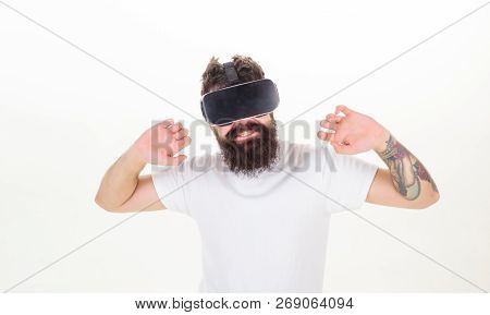Happy Bearded Man Wearing Virtual Reality Goggles Watching Movies Or Playing Video Games. Bearded Ma