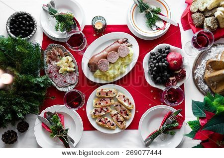 Flat-lay Of Festive Table Setting For Holiday Dinner With Dishes. Traditional Italian Christmas Dinn