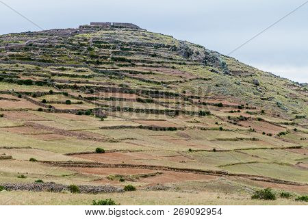 Agricultural Terraces On Pachatata Hill On Amantani Island In Titicaca Lake, Peru