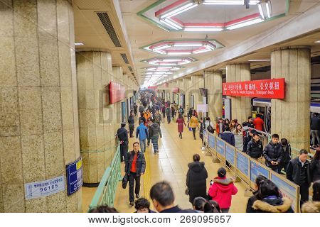 Beijing/china - 24 February 2017:a Lot Of Unacquainted Chinese People Or Tourist Walking And Use The
