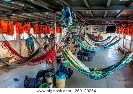 Napo, Peru - July 15, 2015: Travelers In Hammocks Aboard Cargo Boat Arabela I On A River Napo, Peru