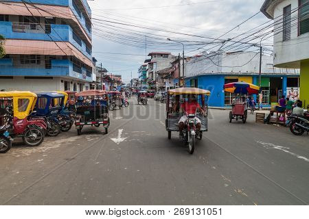 Iquitos, Peru - June 17, 2015: View Of A Street Full Of Mototaxis In Iquitos, Peru