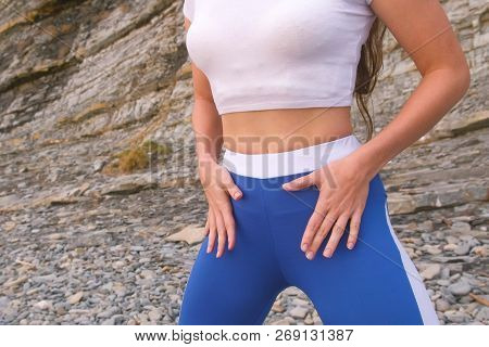 Flat Belly Girl During Breathing Exercises Bodyflex. Belly Close-up View.
