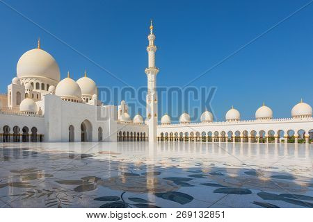 Sheikh Zayed Mosque - Abu Dhabi, United Arab Emirates. Beautiful White Grand Mosque Minerets