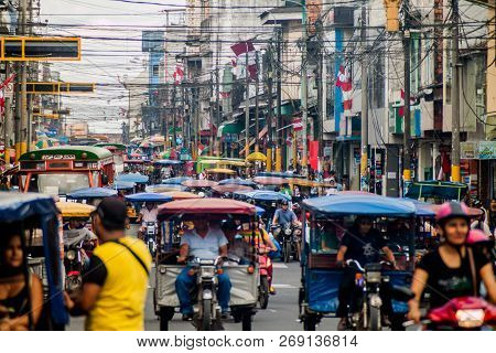 Iquitos, Peru - June 18, 2015: View Of A Street Full Of Mototaxis In Iquitos, Peru