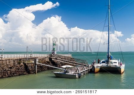 Ile Royale, French Guiana - August 2, 2015: Modern Catamaran Anchored By Ile Royale, One Of The Isla