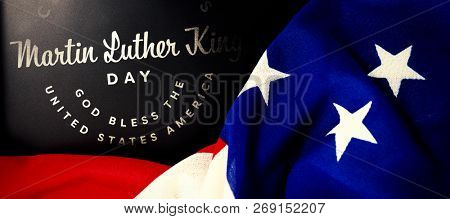 Martin Luther king day against american flag on slate