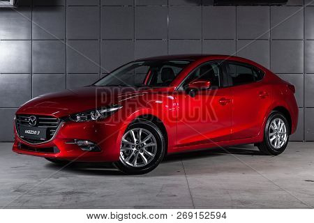 Novosibirsk, Russia - November 16, 2018: Mazda 3, Front View. Photography Of A Modern Car On A Parki