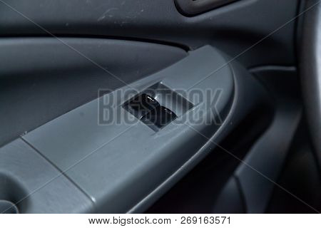 Novosibirsk, Russia - November 16, 2018: Nissan Almera,  Close-up Of The Side Door Buttons. Photogra