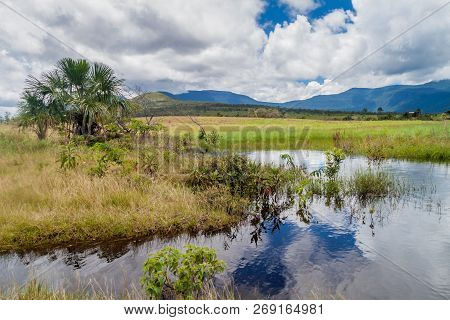River Carrao And Tepuis Table Mountains In National Park Canaima, Venezuela.