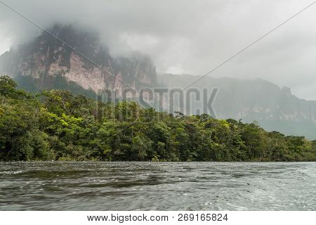 River Carrao And Tepui Table Mountain Auyan In National Park Canaima, Venezuela