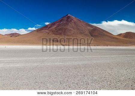 Borax Deposits At Laguna Colorada Lake With Mountain Peaks In The Background, Bolivia