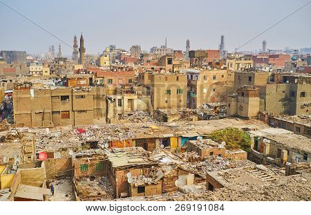 The Residential Quarters Of Islamic Cairo Suffer Of Garbage And Dirt, Which Is Often Collected On Th