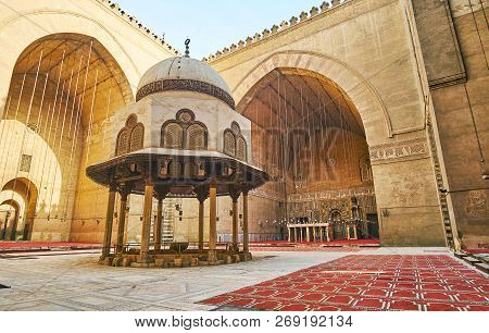 Cairo, Egypt - December 21, 2017: The Mosque-madrasa Of Sultan Hassan Boasts Picturesque Courtyard W