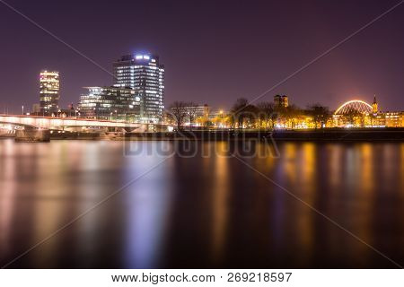 View Of The Illuminated Skyscraper Cologne Triangle, The Deutzer Bridge, The Lanxess Building And Th