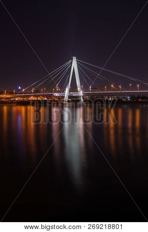 View Of The Illuminated Severins Bridge And The Long River Rhine At Night In Germany Cologne 2018.