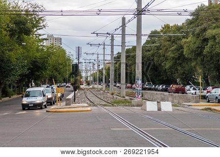 Mendoza, Argentina - March 30, 2015: Tracks Of Metrotranvia Light Rail At Avenida Belgrano Street In