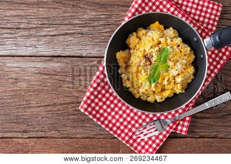 Scrambled Egg On Pan. Top View With Copy Space.