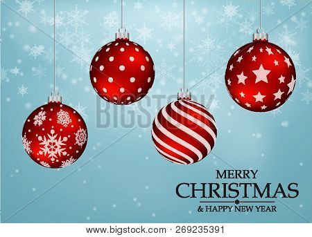 Red Christmas Balls With Snowflakes And Blue Background.