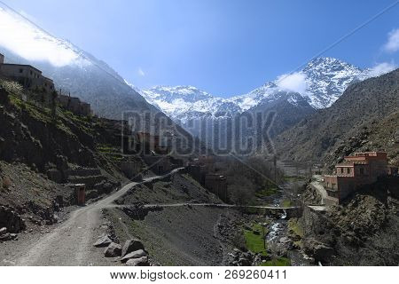Hiking Route To Toubkal Mountain From Imlil On A Sunny Day With The Blue Sky.