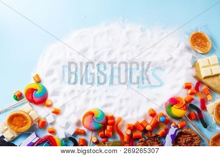 Sweets With Sugar, Flat Lay Frame On Blue With Word Diabetes