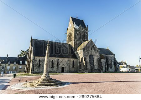 The Famous Church With The Manequin Of Solder On The Tower Bell In St Mere Eglise In Normandy