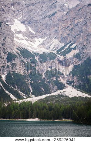 Mudflow With Snow High In The Alpine Mountains Lake, Lago Di Braies