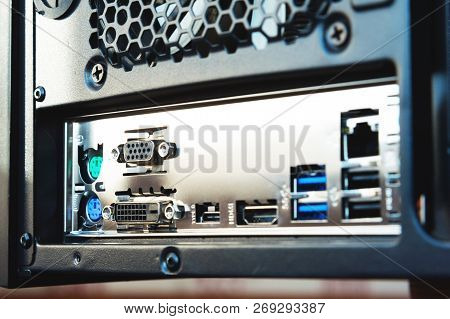Close-up Rear Wall And Ports For Connecting Wires To The Motherboard Installed In The Metal System U