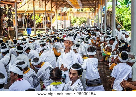 Bali, Indonesia - October 9, 2018: Balinese Boy In Traditional Clothes On Culture Ceremony, Ubud, Gi