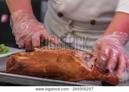 Traditional Chinese Roast Duck Or Da Dong Kaoya Served Tableside At A Chinese Restaurant