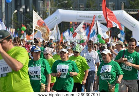 Omsk, Russia - August 12: Marathon Runners In Action At The Siberian International Marathon On Augus