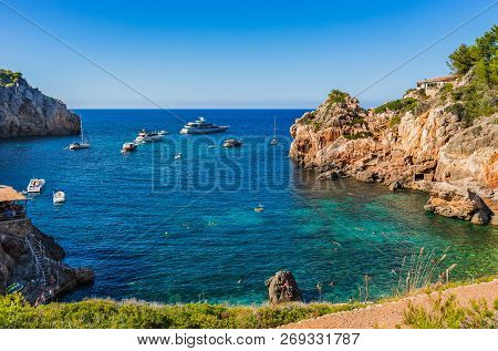 Beautiful Seaside On Majorca Island, Idyllic Bay Of Cala Deia Beach, Spain Mediterranean Sea