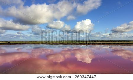Clouds Reflecting In Pink Lake Aerial Photo