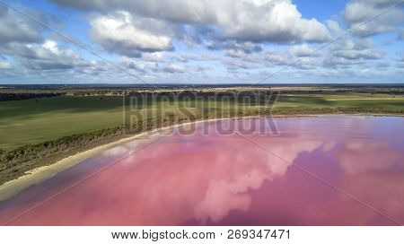 Clouds Reflecting In Pink Lake Aerial Photo