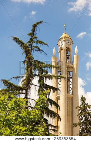 Tirana, Albania- 01 July 2014: Clock Tower In Rinia Park In The Center Of Tirana. Tirana Is The Capi