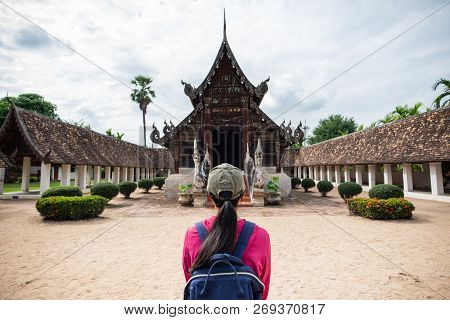 Back View Of Traveler Wowan Standing At Wat Ton Kwen (wat Inthrawat), Ancient Temple In Chiang Mai,t