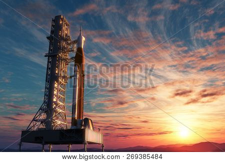 Space Launch System On Launchpad Over Background Of Sunrise. 3d Illustration.