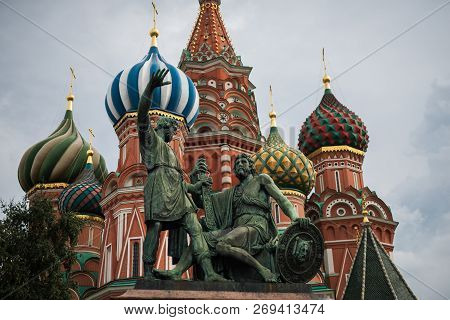 Monument To Minin And Pozharsky On St Basils Church Background