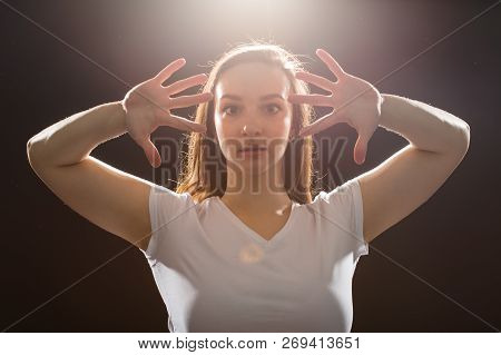 Hip-hop, Jazz-funk, Tecktonik, Waacking, Trance And Street Dances Concept - Young Woman Dancing Jazz