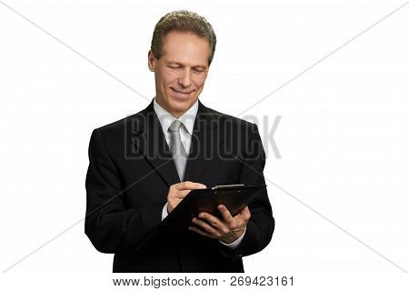 Handsome Mature Businessman Holding A Folder. Caucasian Businessman Signing A Contract, Isolated On 