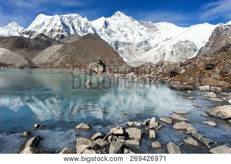 View Of Mount Cho Oyu Mirroring In Lake - Cho Oyu Base Camp - Everest Trek - Nepal Himalayas Mountai