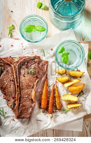 Delicious Tbone Steak Seasoned With Salt And Rosemary