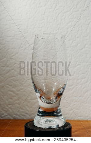 Dirty Glass Of Smusy With The Superheated Grounds On A White Background