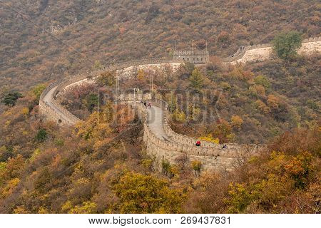 Mutianyu, China - 20 October 2018: Tourists On The Great Wall Of China At Mutianyu On Smoggy Day