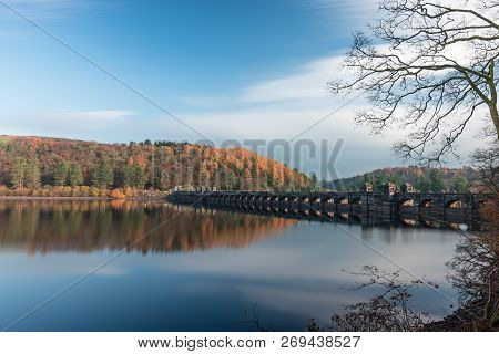 Lake Vyrnwy Dam In Autumn With Reflection