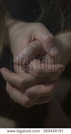 Mental Health Psychosis And Depression Photo. Close-up Hands Shrink From Nerves. Toning, Low Key, Se