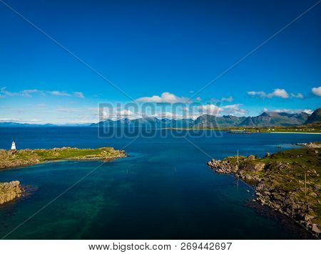 Scenic Seascape With Lighthouse At Hovsund Fishing Port, Gimsoya Lofoten Islands In Norway