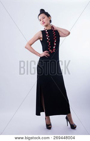 Beautiful Asian Woman Portrait Isolated Looking At Camera